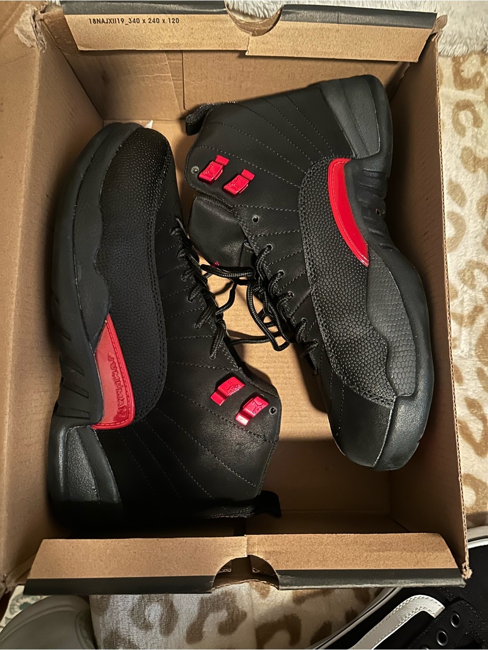 Jordan Women's Black and Red High-Top Sneakers